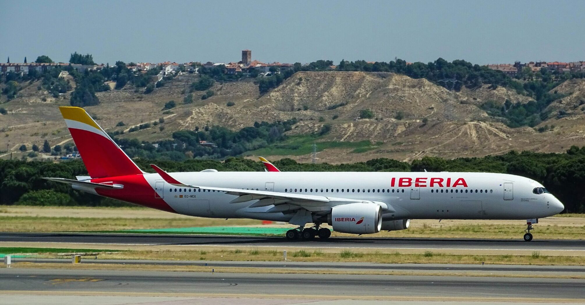 Iberia aircraft on the runway ahead of long-haul operations