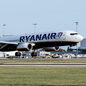 Ryanair aircraft touching down on the runway