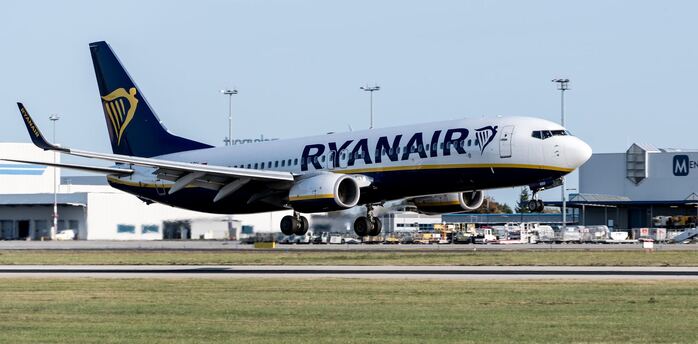 Ryanair aircraft touching down on the runway