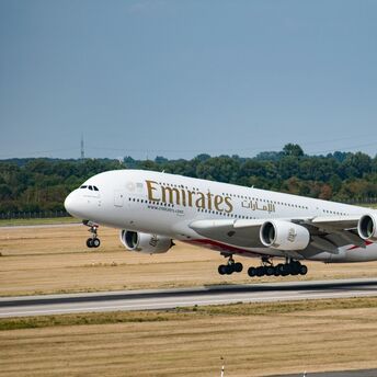 Emirates aircraft taking off from the runway