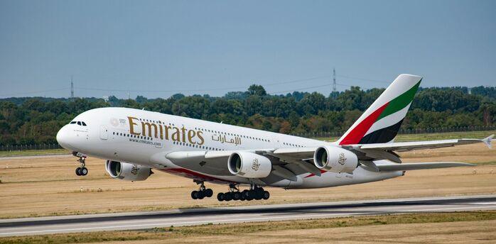 Emirates aircraft taking off from the runway