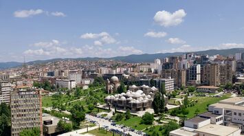 Aerial view of central Pristina with landmarks and residential areas