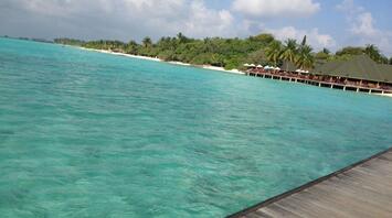 Turquoise waters and beachfront resort on a tropical island