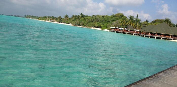 Turquoise waters and beachfront resort on a tropical island