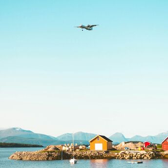 Airplane flying over Molde’s coast in Norway