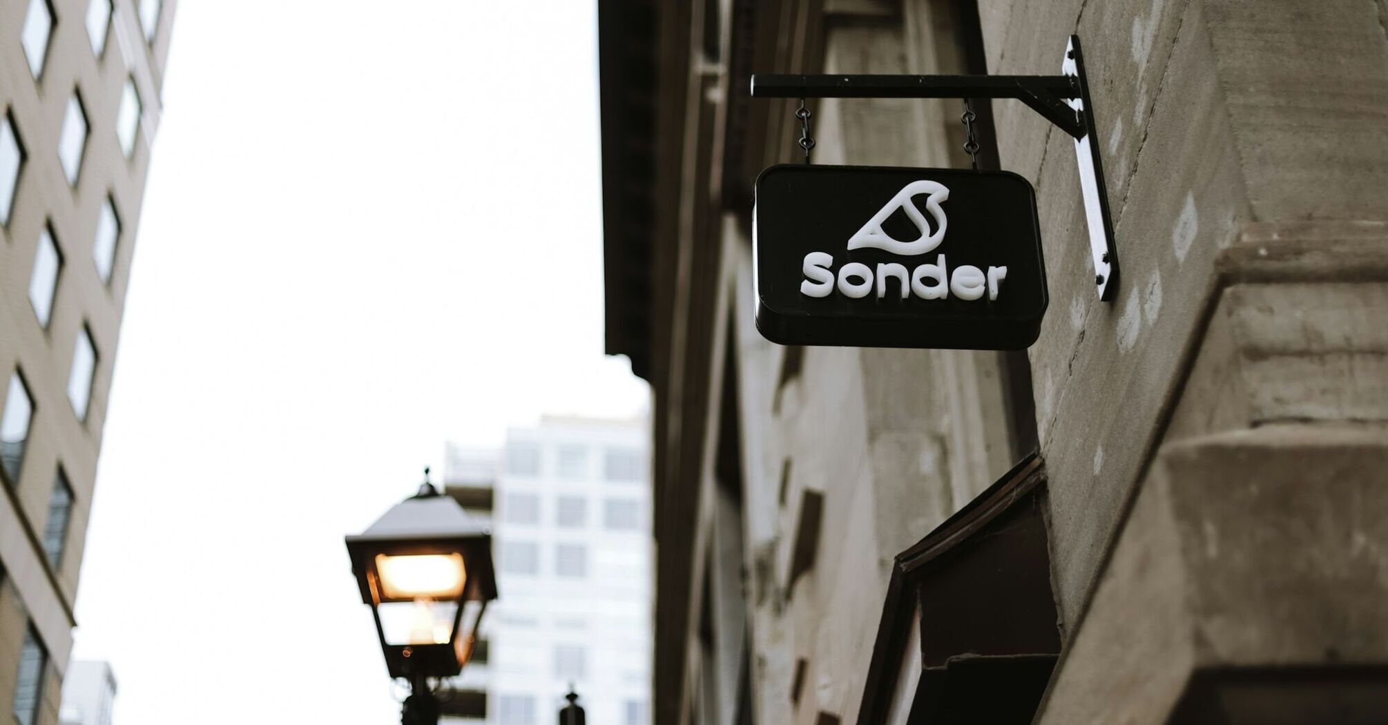 Sonder logo sign on a city building