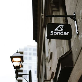 Sonder logo sign on a city building