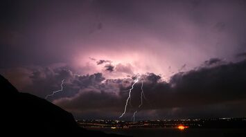 Lightning storm over Italian coast during night