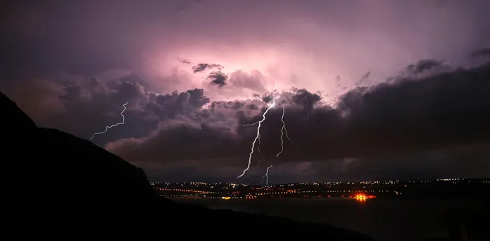 Lightning storm over Italian coast during night