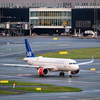 SAS aircraft taxiing at a Scandinavian airport