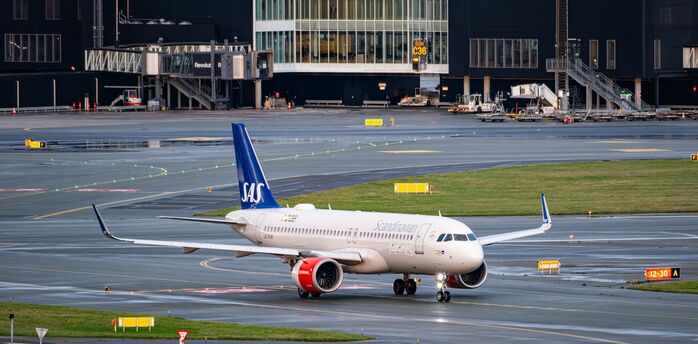 SAS aircraft taxiing at a Scandinavian airport