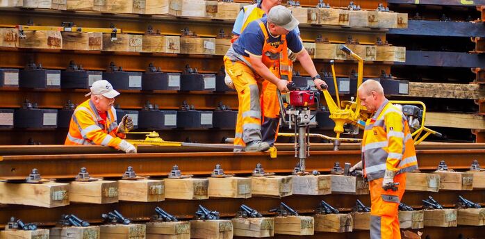Rail workers carrying out maintenance