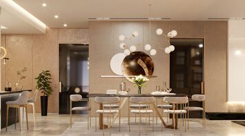 Elegant dining space with modern lighting and warm neutral interiors