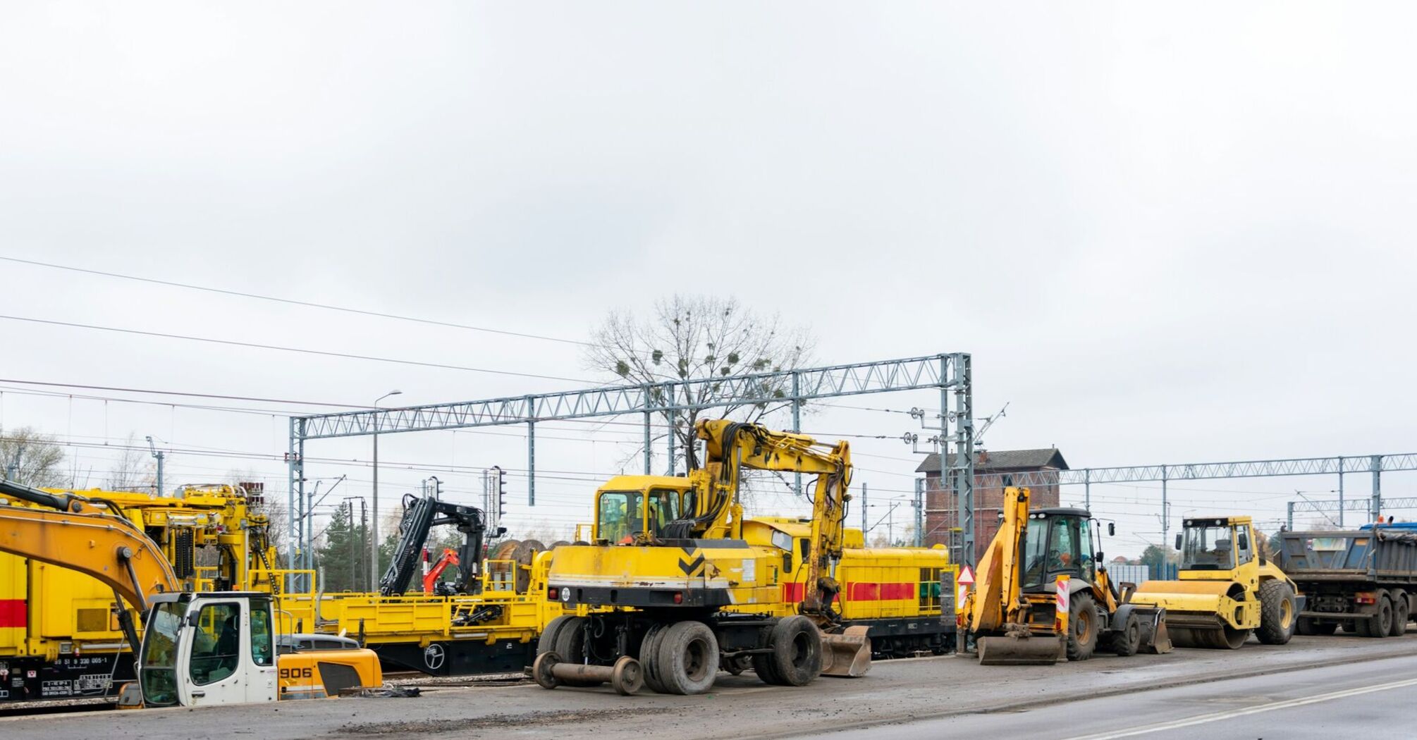 Rail maintenance machinery positioned along a railway line during upgrade works