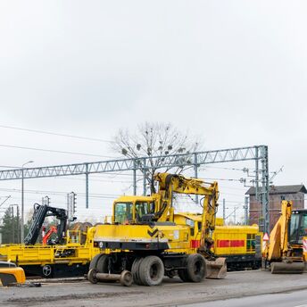 Rail maintenance machinery positioned along a railway line during upgrade works
