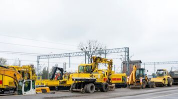 Rail maintenance machinery positioned along a railway line during upgrade works