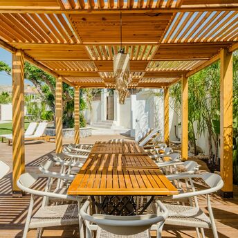 Outdoor dining area at a coastal resort