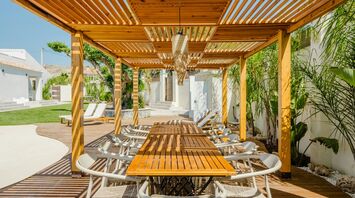 Outdoor dining area at a coastal resort