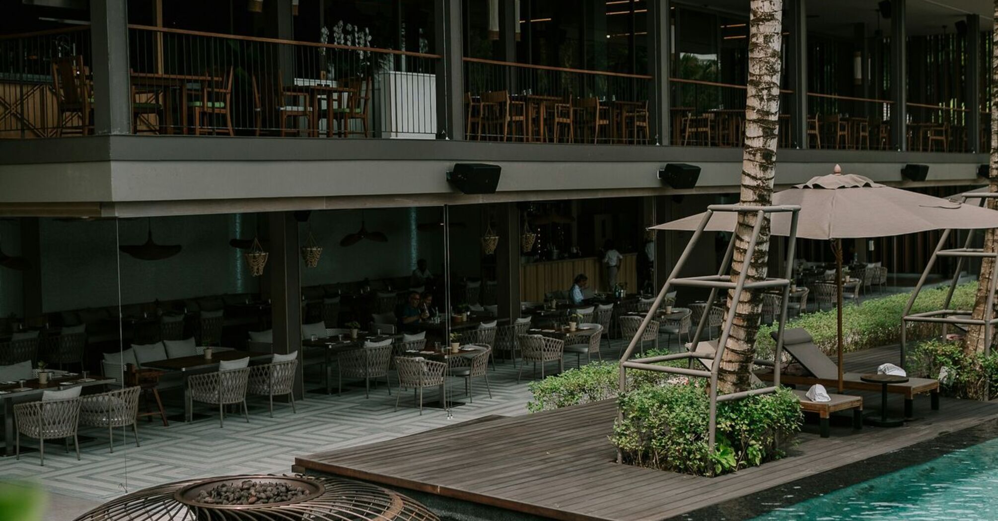 Resort complex with poolside dining area