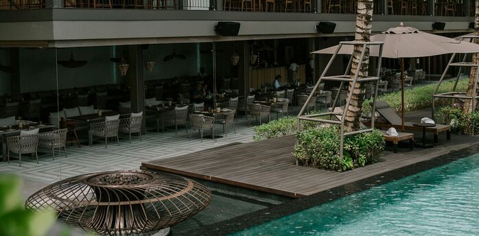 Resort complex with poolside dining area