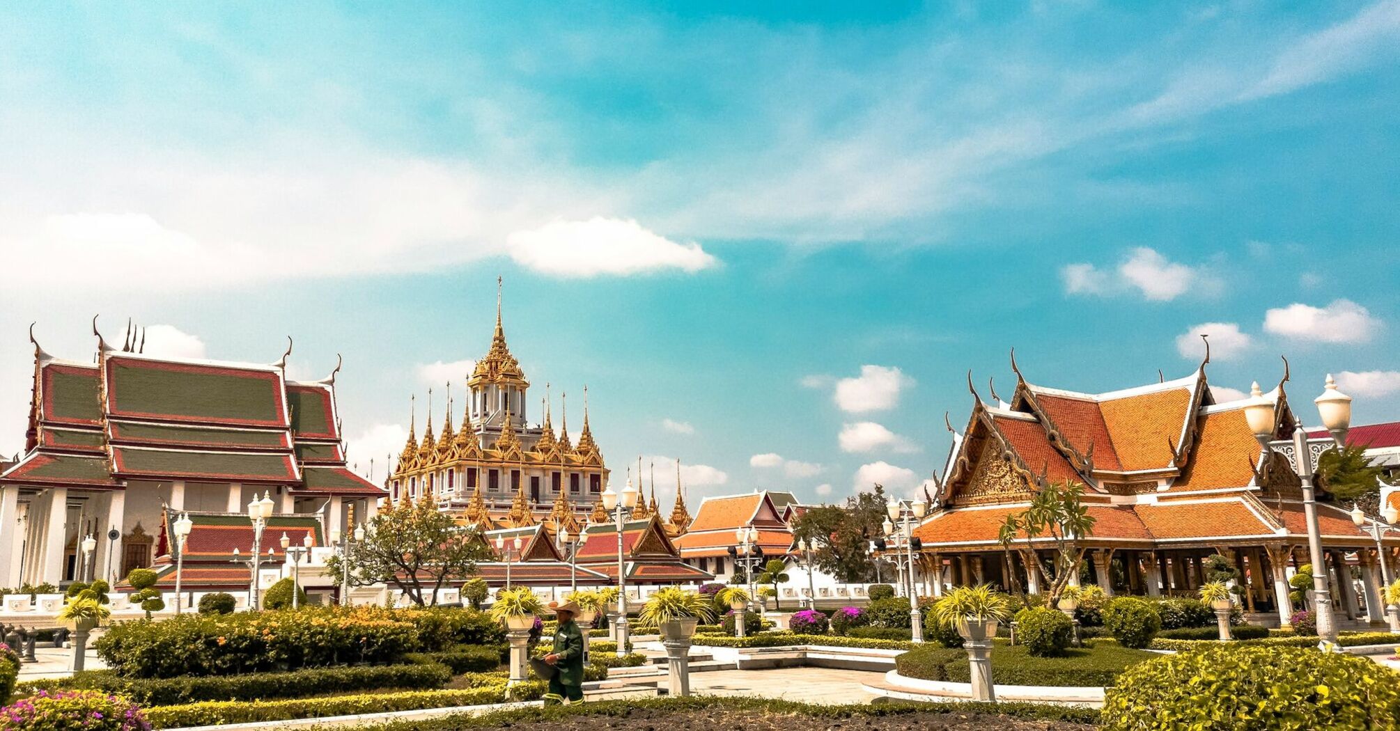 Bangkok temple complex under clear blue sky