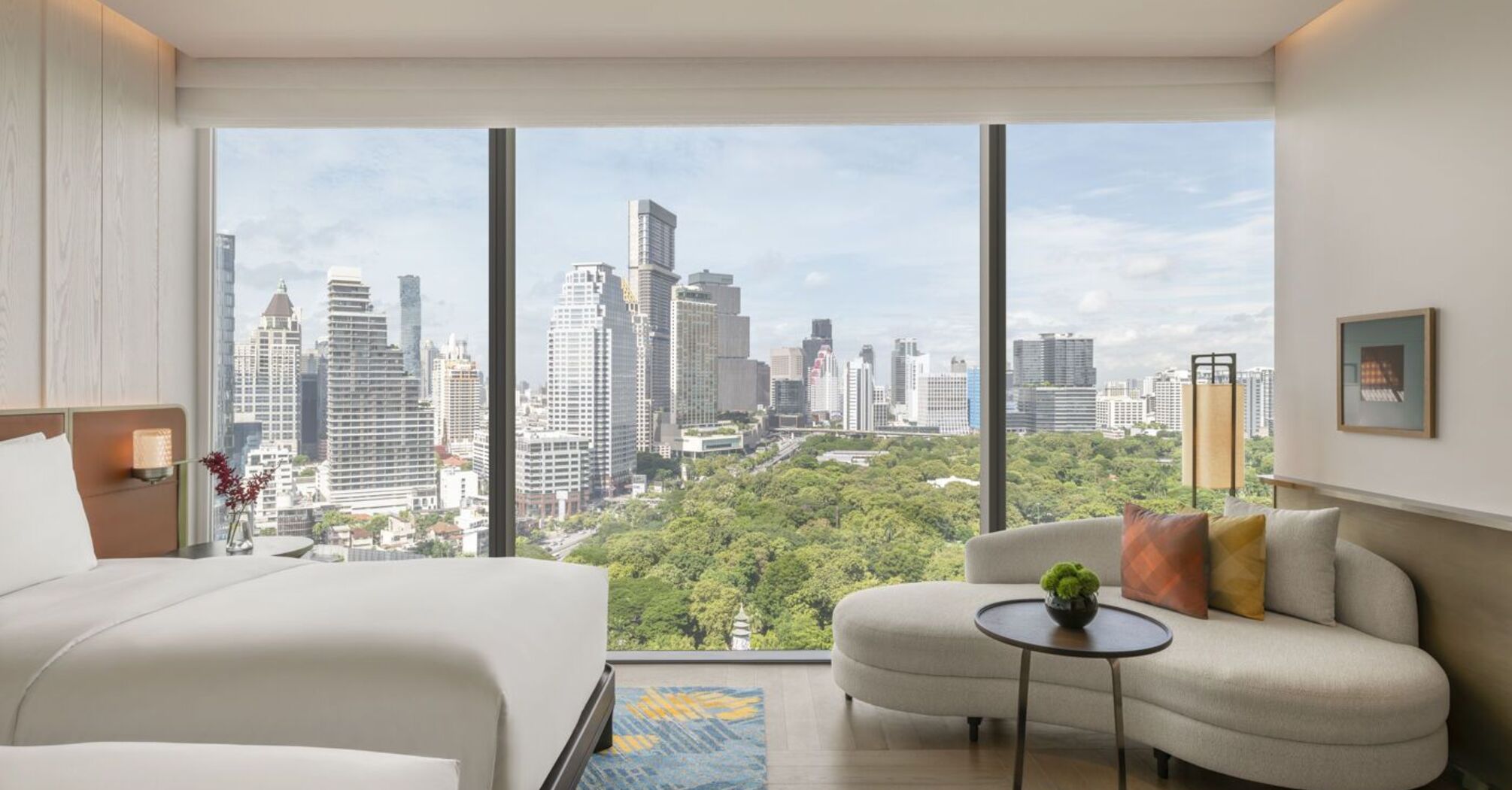 Guest room overlooking Lumphini Park in central Bangkok