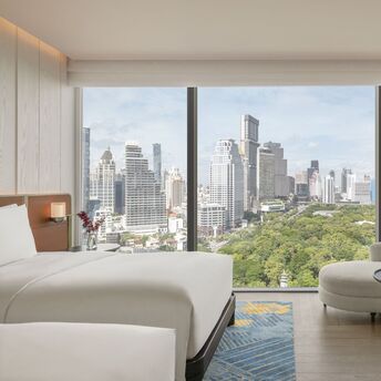 Guest room overlooking Lumphini Park in central Bangkok