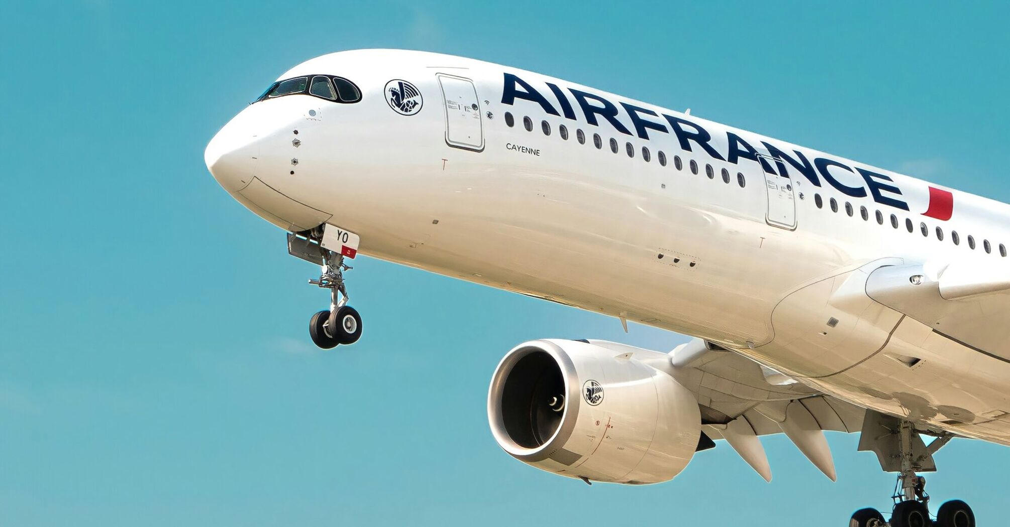 Air France Airbus aircraft climbing against a clear blue sky
