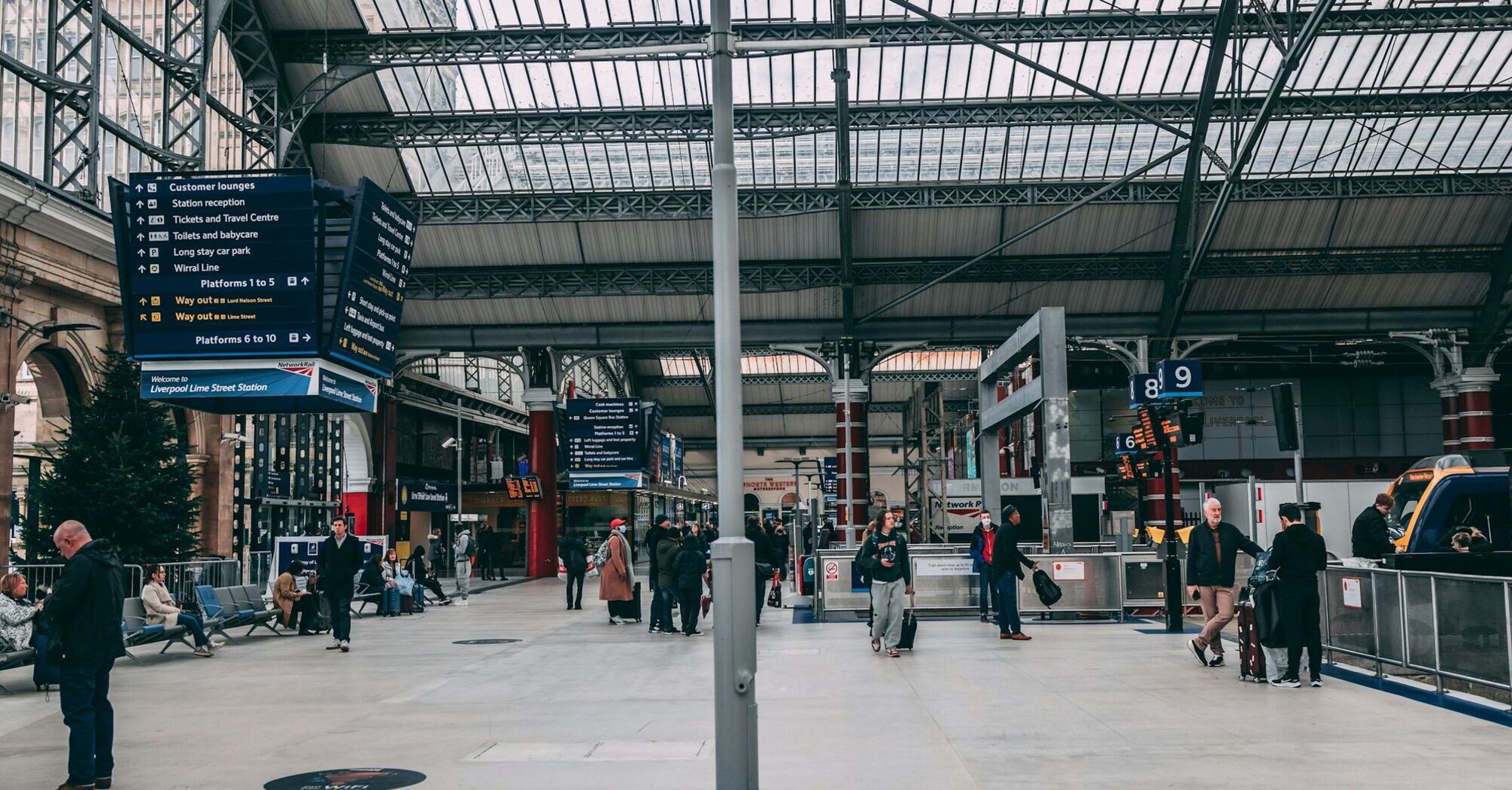 Passengers waiting inside Liverpool Lime Street station