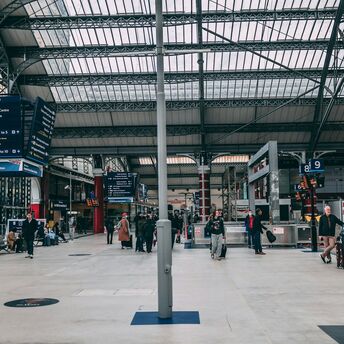 Passengers waiting inside Liverpool Lime Street station