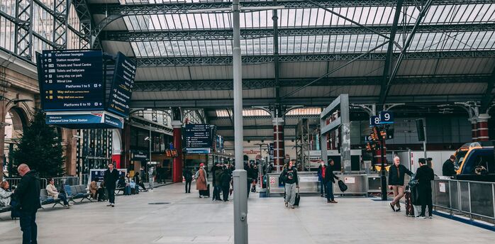 Passengers waiting inside Liverpool Lime Street station