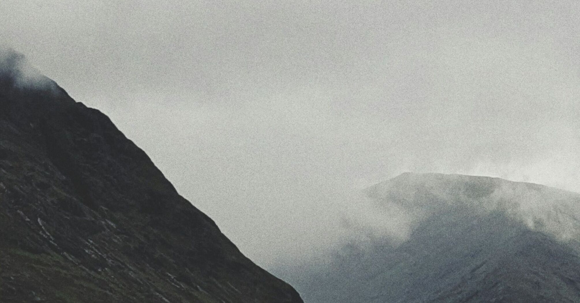 Fog-covered mountains in the Scotland