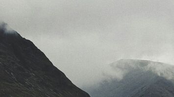 Fog-covered mountains in the Scotland