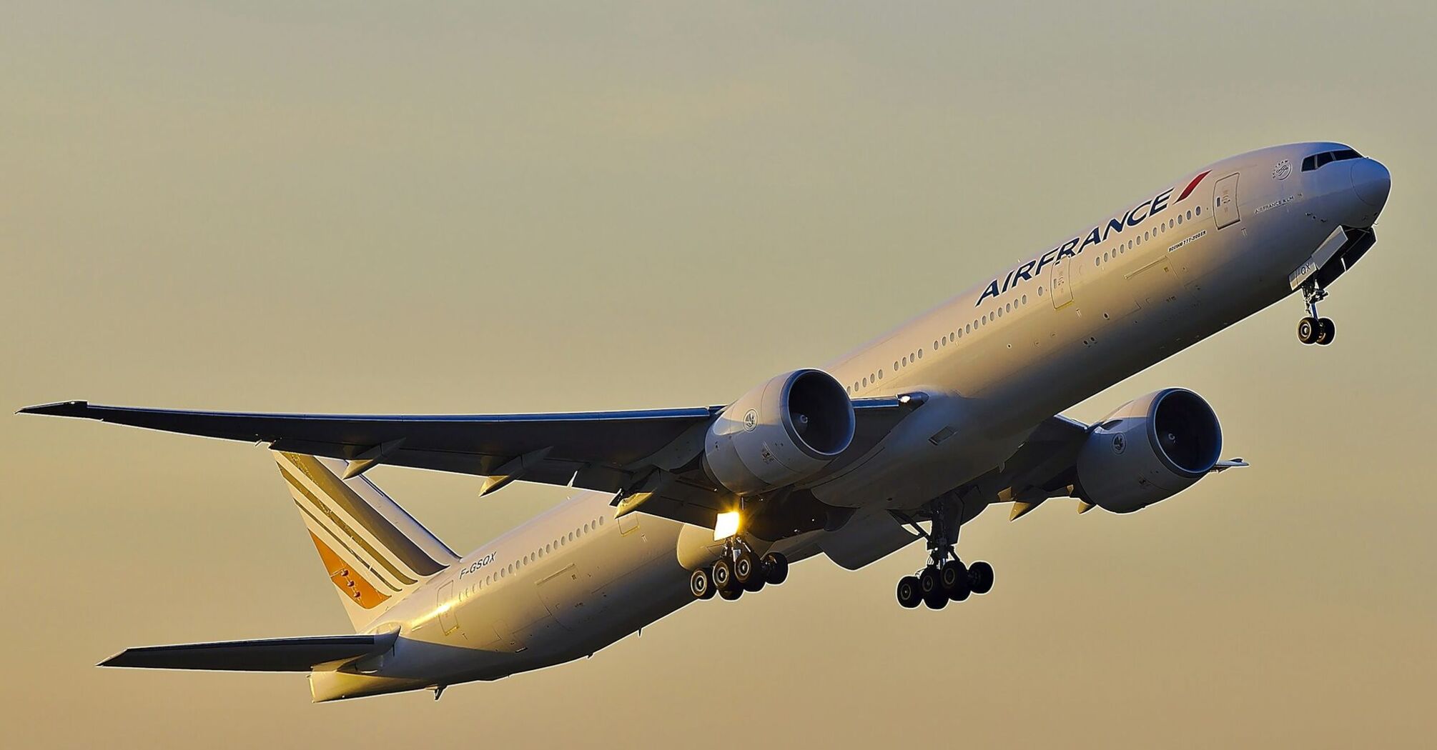 Air France plane taking off at sunset