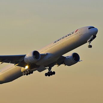 Air France plane taking off at sunset