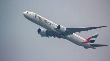 Emirates Boeing 777 aircraft flying in the sky