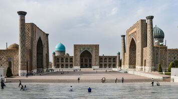Registan Square in Samarkand, Uzbekistan, featuring historic madrassahs with intricate tilework and turquoise domes