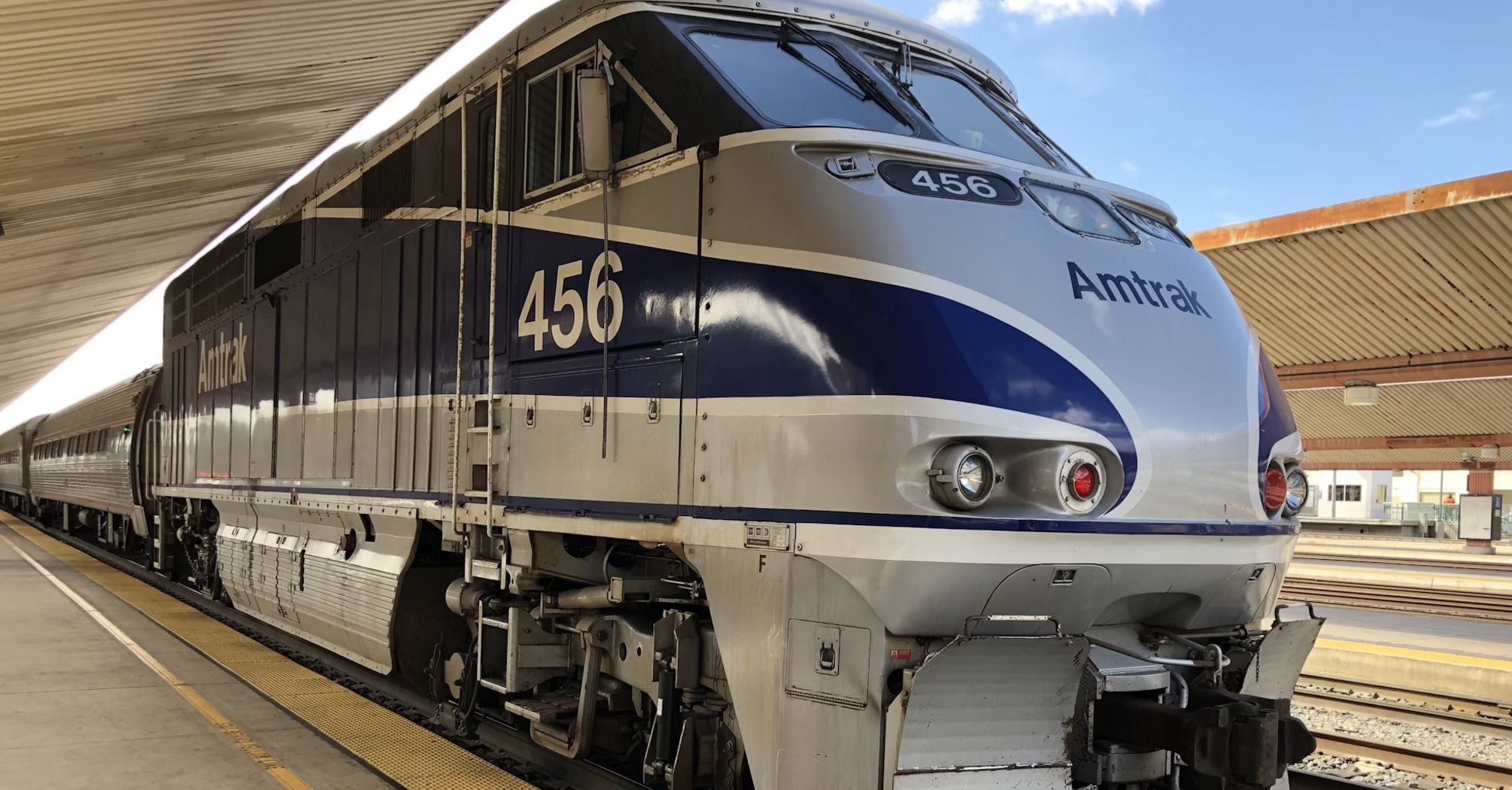 Amtrak locomotive at a station platform, ready for departure