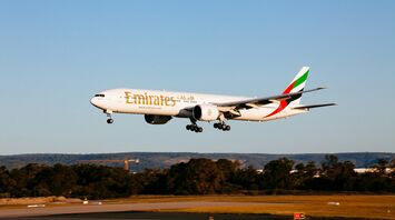Emirates aircraft approaching runway during landing