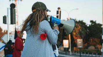 Protester with megaphone at strike