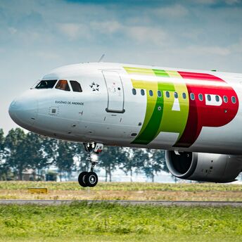 TAP Air Portugal aircraft taking off on a runway