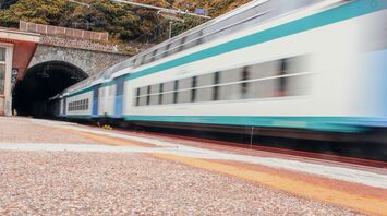 Train entering tunnel on Italian railway line
