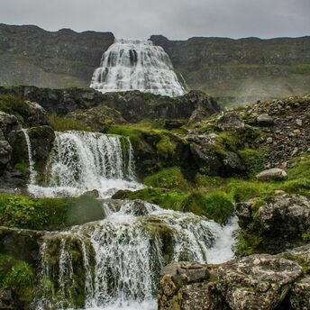 Dynjandi waterfall cascading down a rocky mountain in Westfjords, Iceland
