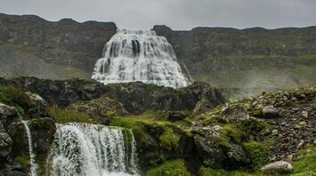 Dynjandi waterfall cascading down a rocky mountain in Westfjords, Iceland