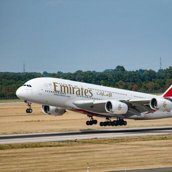 Emirates Airbus A380 taking off from the runway during daytime