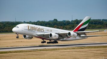 Emirates Airbus A380 taking off from the runway during daytime