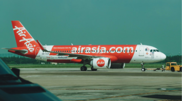 AirAsia airplane on the tarmac at an airport