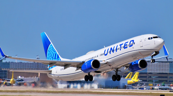 United Airlines aircraft taking off from airport runway