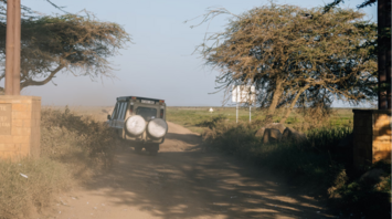 A vehicle entering Serengeti National Park through main gate in Tanzania