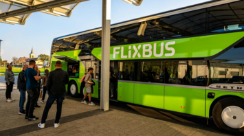 A FlixBus coach parked on a sunny street
